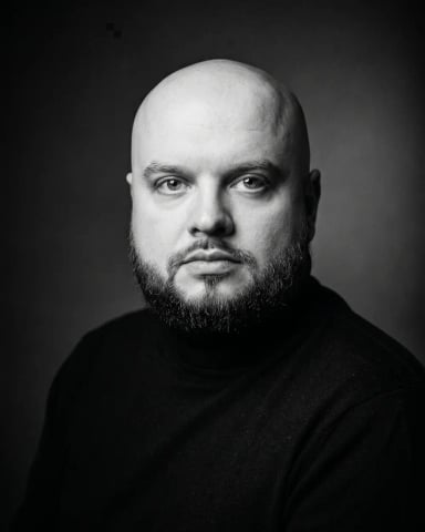 Portrait of Przemek Czerpiński, founder of Daiven